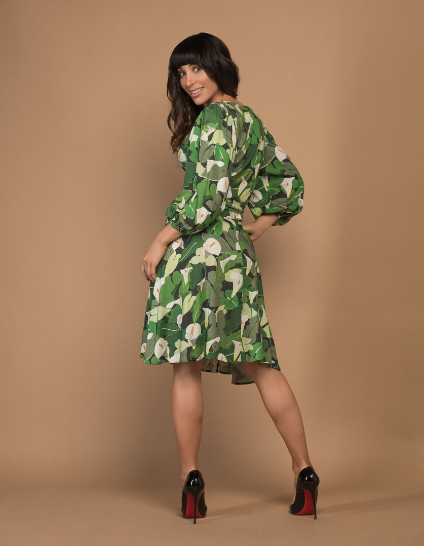 DEVOI wrap dress printed Calla Lilies green.  Back view on model