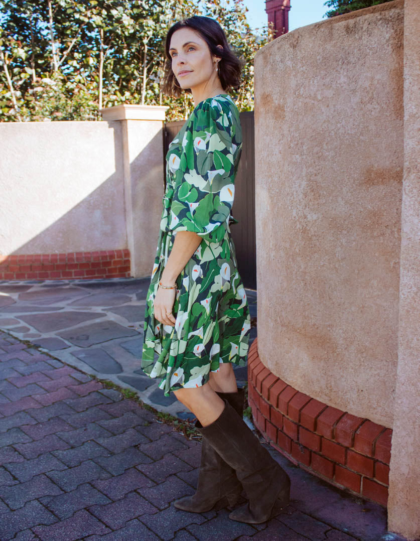 DEVOI wrap dress printed Calla Lilies green. Side view on model