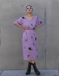 DEVOI Lilac I Can Toucan printed Margot skirt. Midi skirt with a back elasticated waistband and pockets. Front view