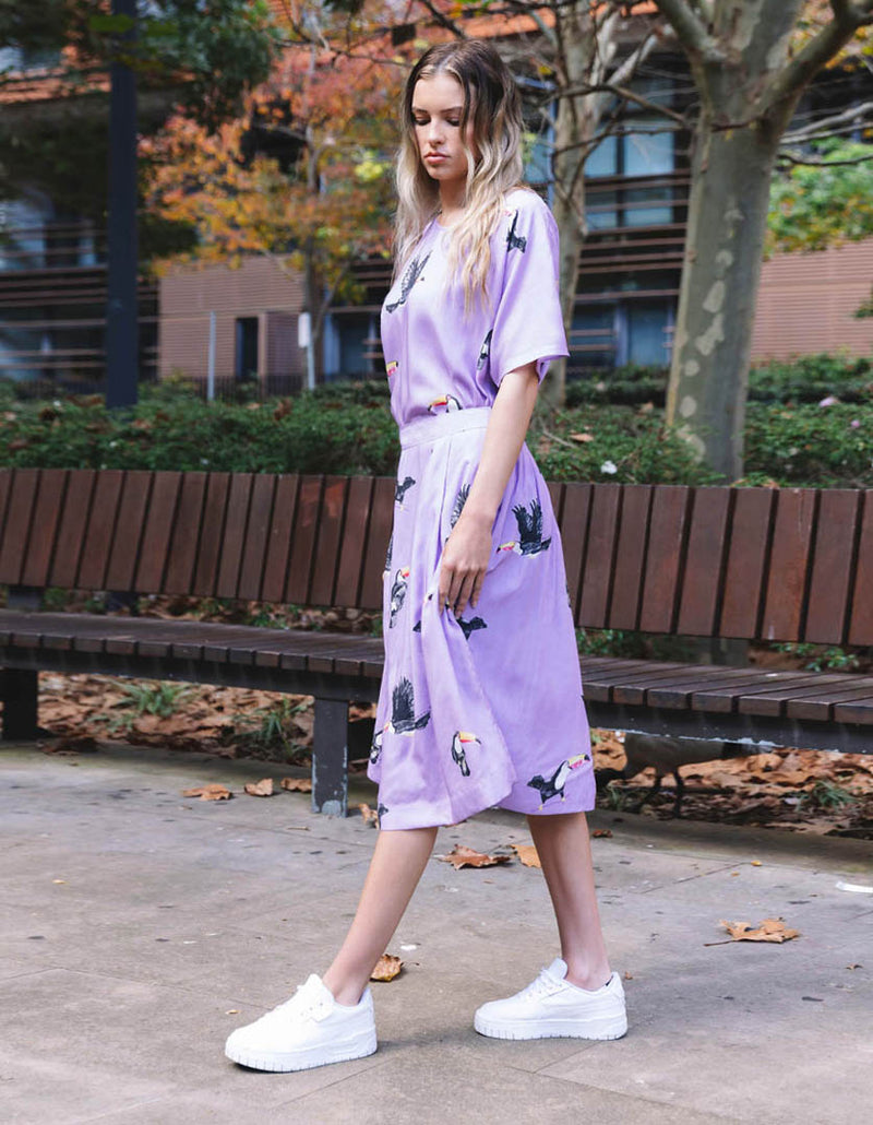 DEVOI lilac printed Annabella tee with batwing sleeves and a round neckline, makes a very flattering fit. Side full length view