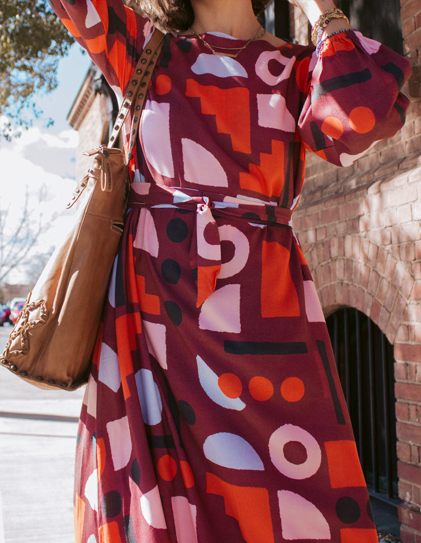 DEVOI Sybille dress in Block Party printed rayon. Front close-up view.