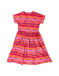 DEVOI Kayleigh dress in Sunset Tide printed 100% Organic Cotton Soft v-neck dress with short sleeves. Finishes just below the knee depending on height. Back flat lay view