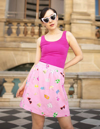 DEVOI Phillipa skirt in pink beach Flatlay print. 100% Modal.  Front view on model.