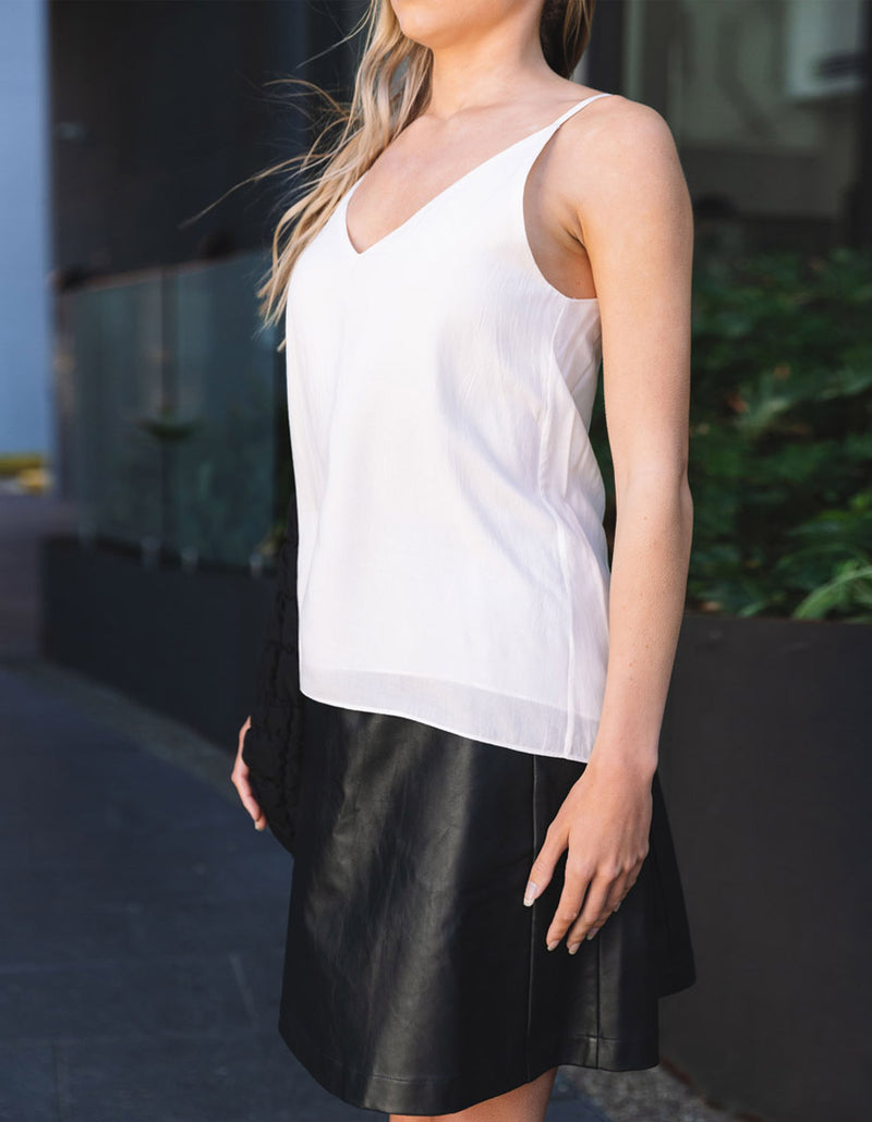 DEVOI Bobby top in cream modal crepe. V-neck vest top with thin straps. Front close up