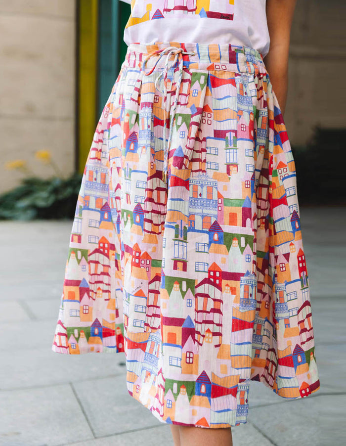 DEVOI Kathleen skirt in Urban Scapes print. Front view. 100% Linen, hand painted print. skirt close-up